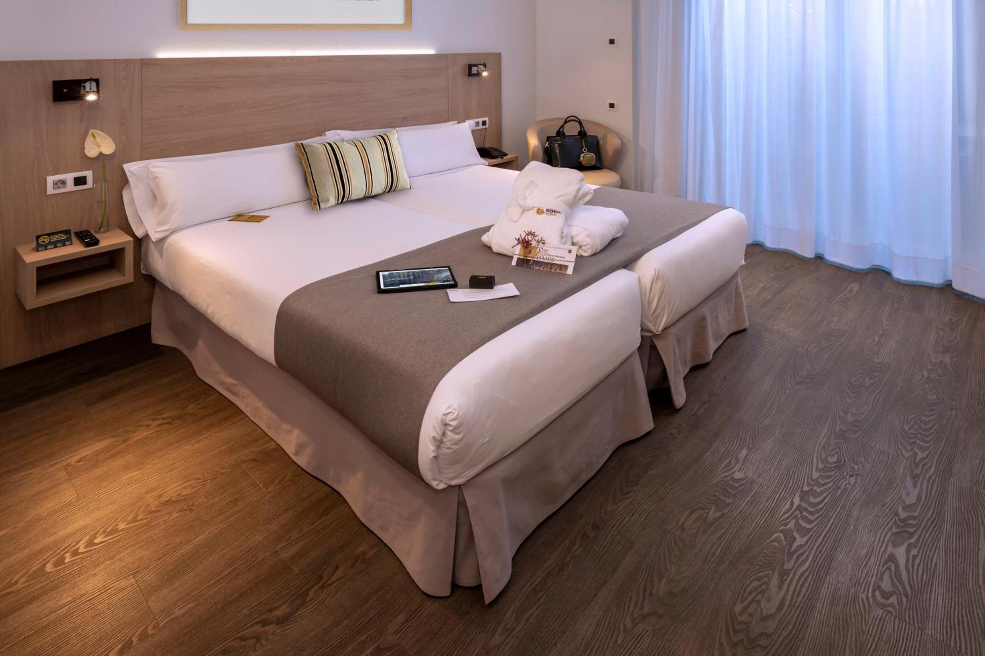 Luxe Kamer met 1 of 2 Bedden en Balkon