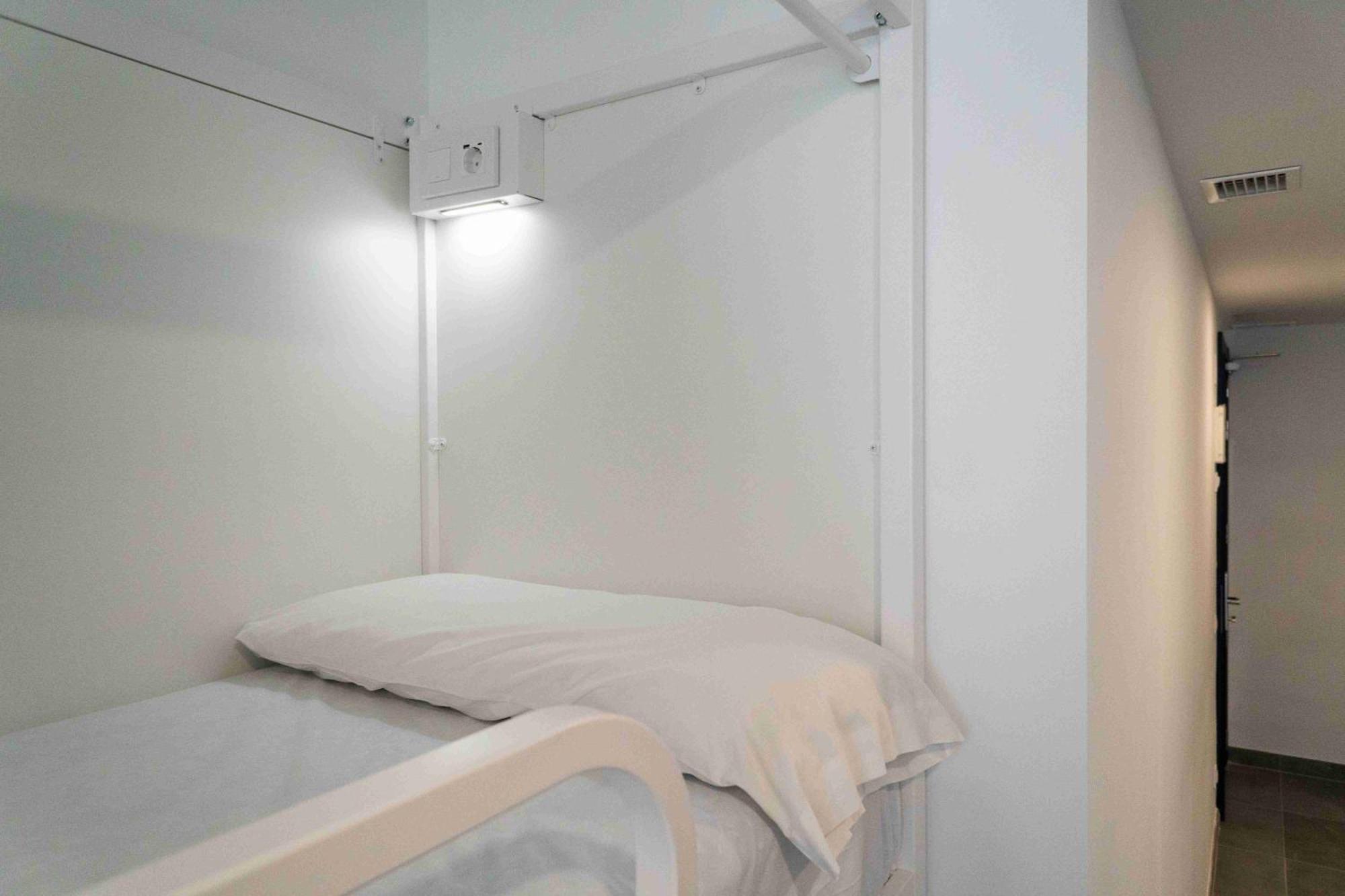 Cama num Dormitório Misto com 8 Camas (Casa de Banho Privativa)
