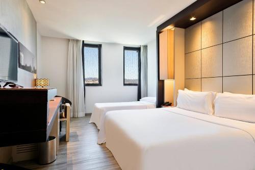 Quarto Duplo Standard com Cama Extra