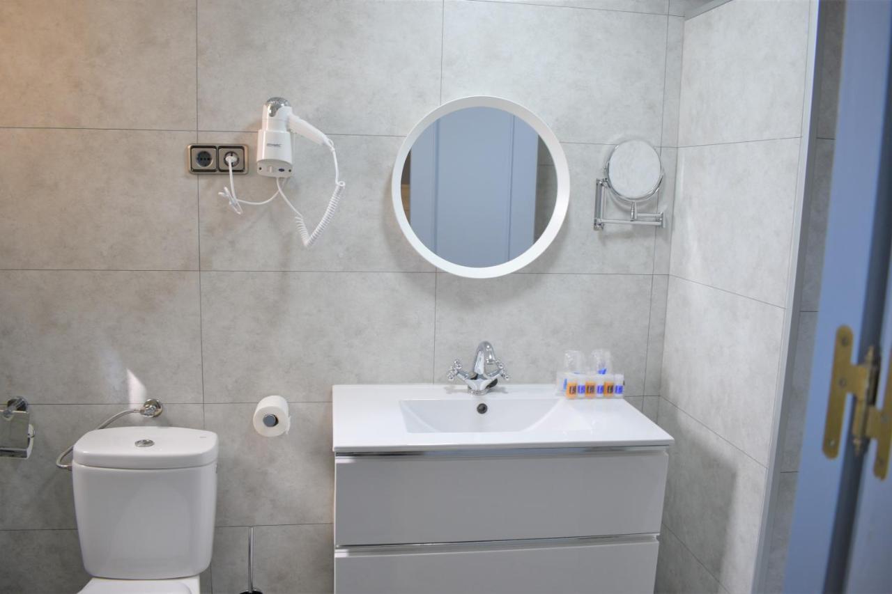 Tweepersoonskamer met Twee Extra Bedden